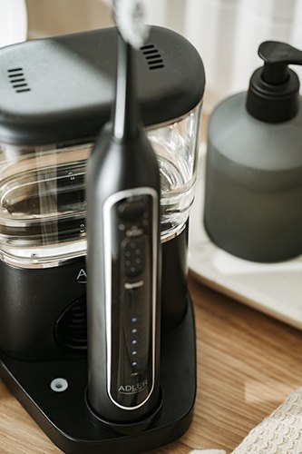 AD 2180b Szczoteczka soniczna z irygatorem 2 w 1