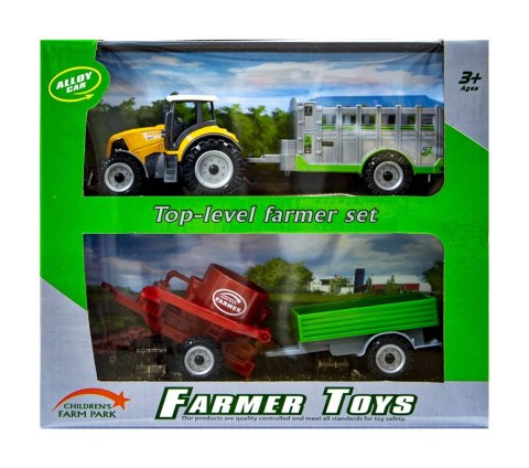 Traktor z wymiennymi przyczepami pomarańczowy