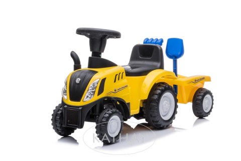 Jeździk odpychacz traktor z przyczepką i funkcjami dźwiękowymi oraz świetlnymi NEW HOLLAND żółty